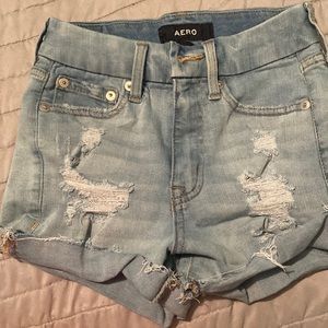 AERO Distressed light jean shorts size 0